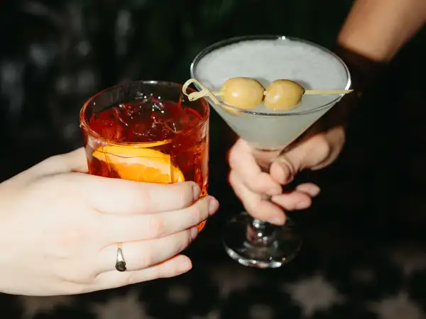 Friends enjoying a cocktail toast at Casa Bella...cheers! 